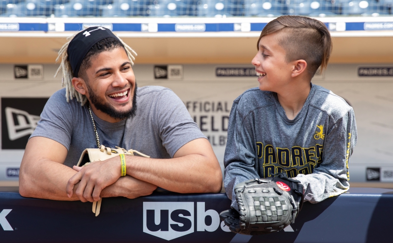 Fernando Tatis, Jr. laughs with Caden.