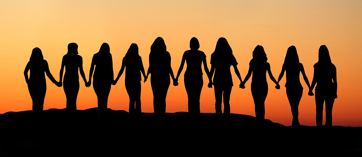 Women holding hands